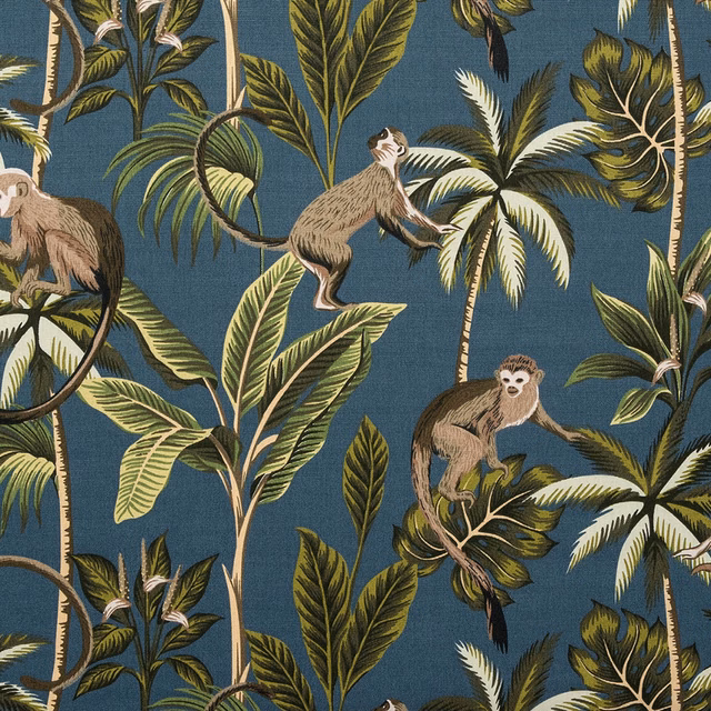 Teal tropical monkey print on coated cotton with palm leaves