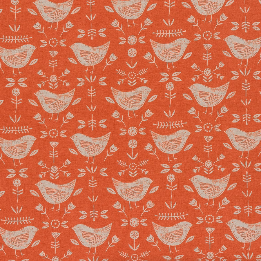 Burnt orange coated fabric with cream folk birds and floral sprigs