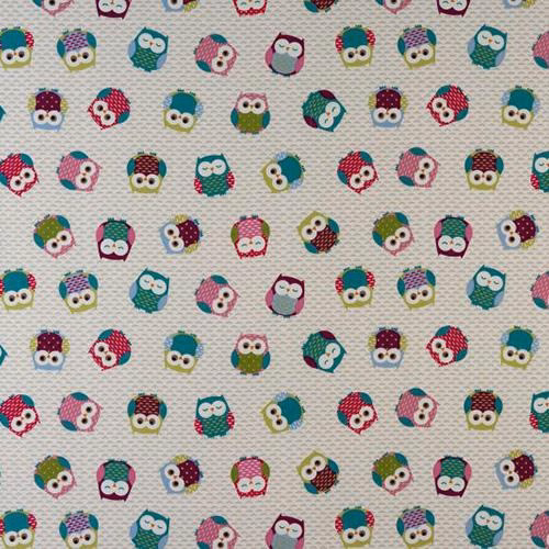 Colourful owl motif scattered across a pale wipe-clean PVC-coated fabric