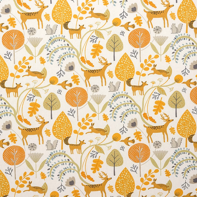 Ochre woodland animal print on a cream PVC-coated cotton fabric swatch