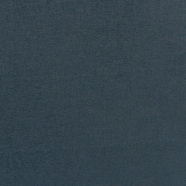 Close-up of deep peacock teal plain-woven fabric with fine texture