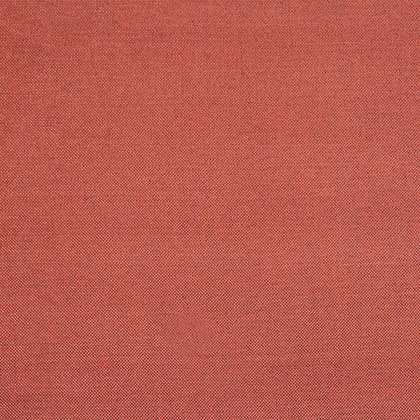 Warm terracotta plain weave fabric swatch with fine textured finish