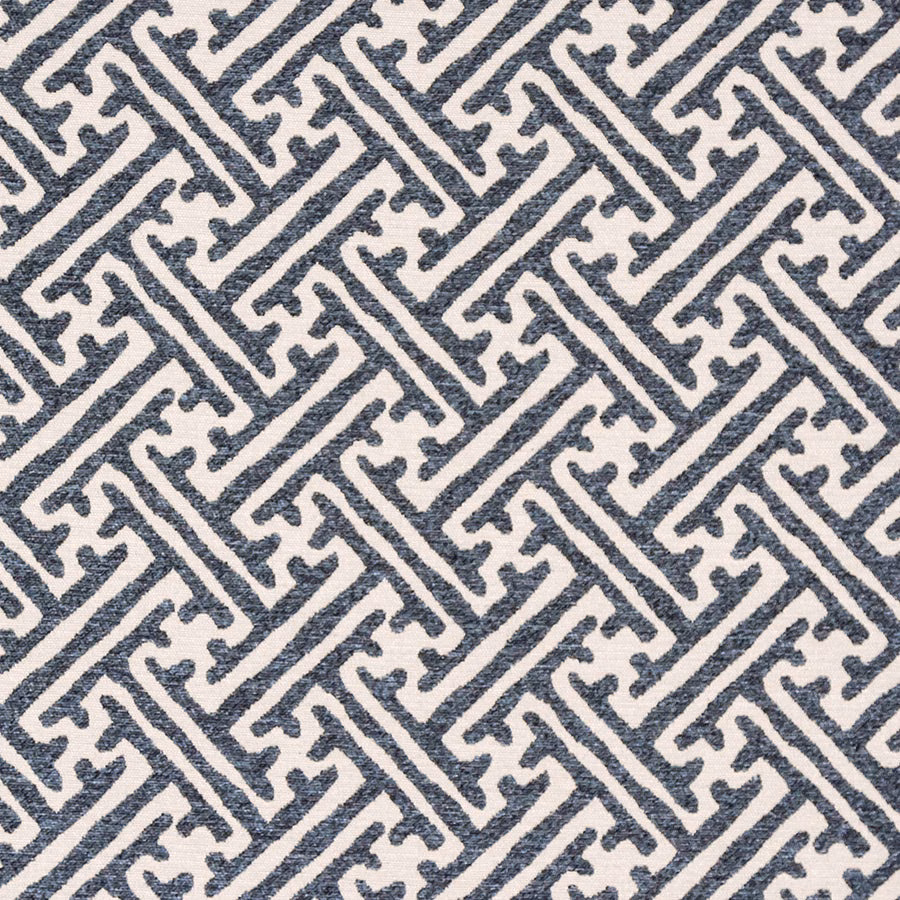 Blue and cream geometric fabric swatch with textured woven finish