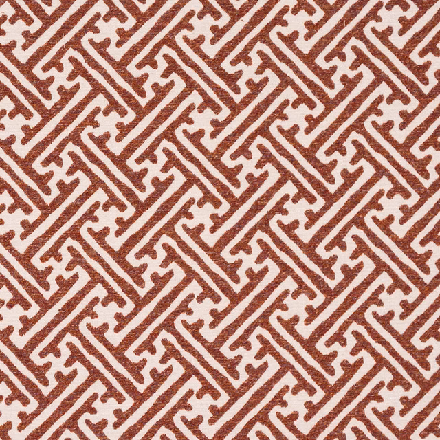 Terracotta and cream geometric patterned fabric with a textured woven look