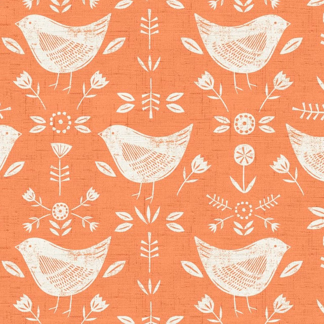 Burnt orange cotton fabric with white folk birds and floral sprigs