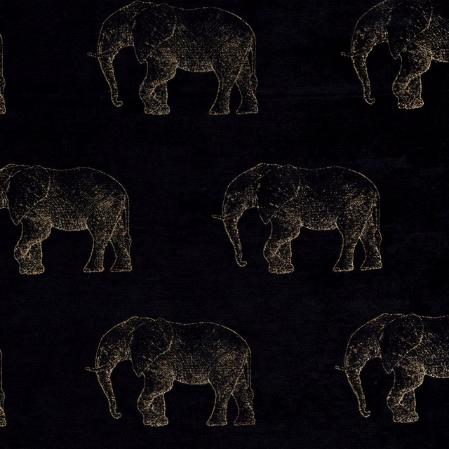 Black fabric swatch with gold elephant motif and subtle textured print