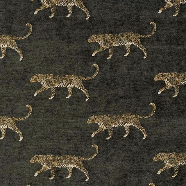 Dark olive-grey leopard print fabric with sandy spotted cats and textured ground