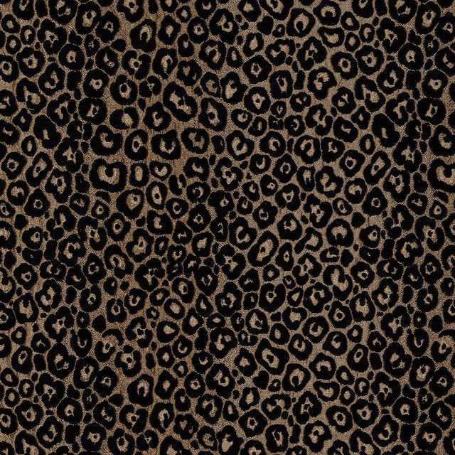 Close-up of bronze leopard spots on a black woven fabric swatch