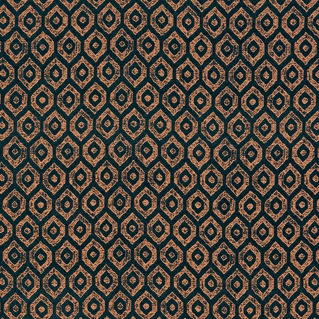 Close-up of a small geometric teal fabric with copper metallic detailing
