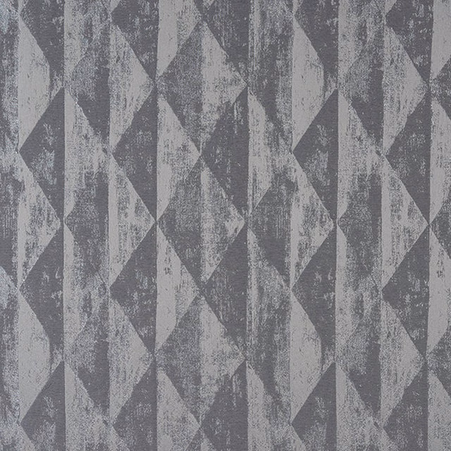 Silver-grey geometric fabric with a softly distressed metallic sheen