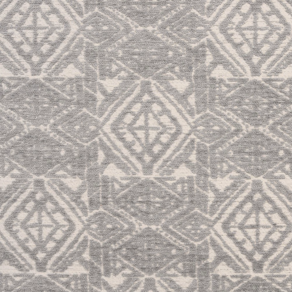 Soft dove-grey geometric upholstery fabric with faded diamond motifs