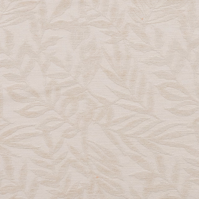 Cream-toned woven fabric with a soft leafy floral pattern and matte texture