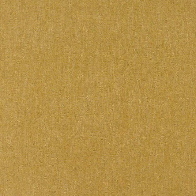 Close-up of a muted gold plain-woven upholstery fabric with fine linen-like texture