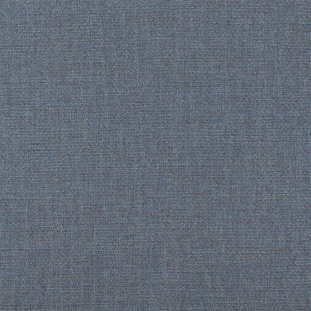 Close-up of muted slate blue woven upholstery fabric with fine textured weave