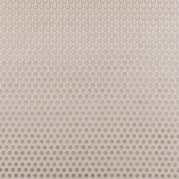 Pale antique beige fabric with small repeating circular motif and soft woven texture