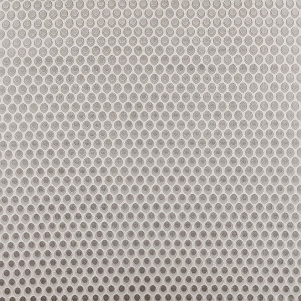 Close-up of Brooklyn Dove fabric in soft grey, with a small circular repeat on a pale ground.