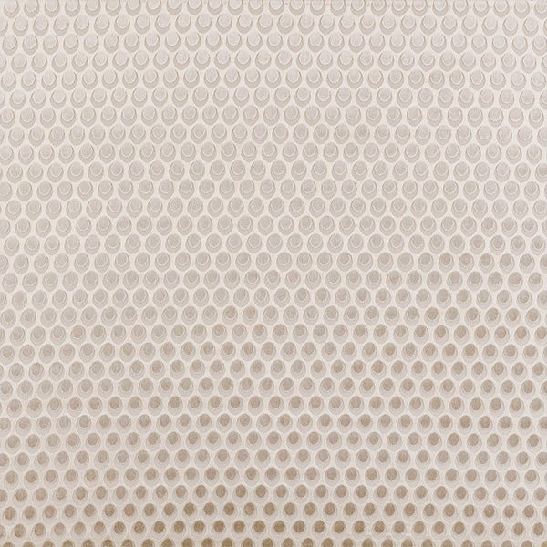 Swatch of beige circular motif fabric on a warm natural ground