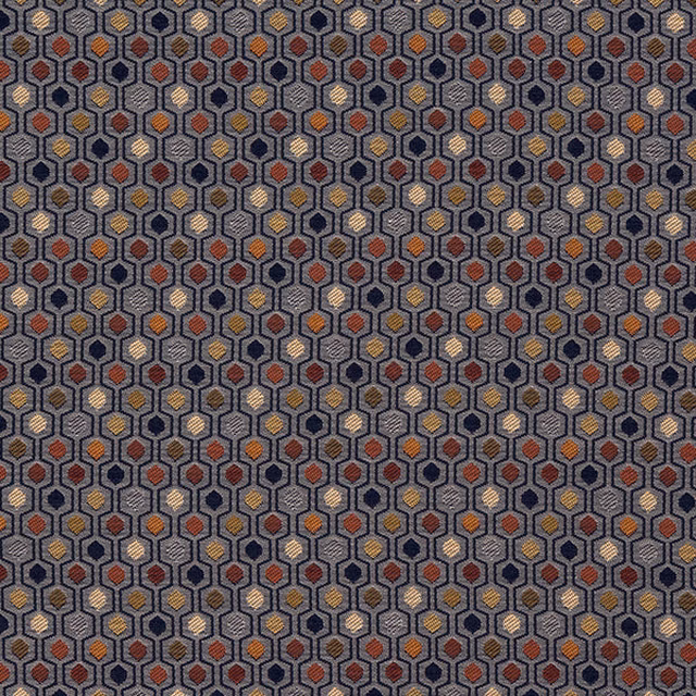 Small geometric fabric swatch in blue-grey with ochre, rust and mustard accents
