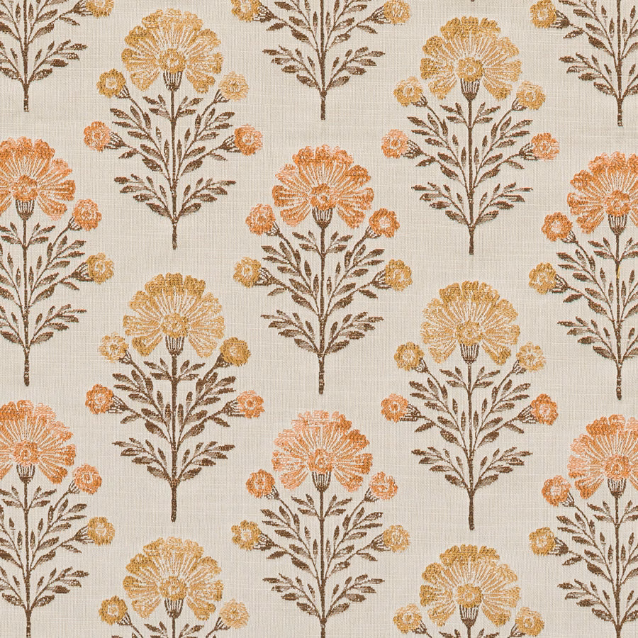 Cream fabric with repeating stylised floral motifs in apricot, ochre and brown