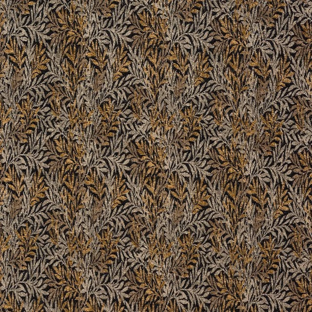 Close-up of a gold, taupe and brown botanical woven fabric with dense leaf motif