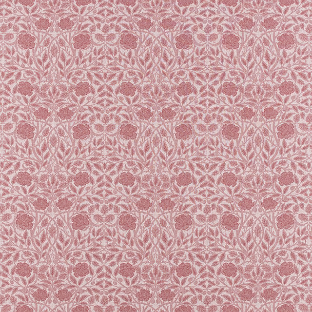 Dusty rose pink floral woven fabric with small repeating leaf and bloom pattern