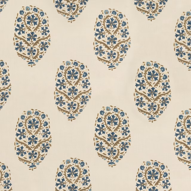 Cream linen fabric with indigo and taupe floral medallions in a repeating pattern