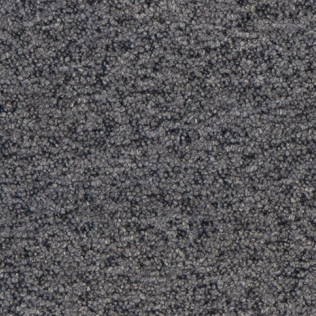 Close-up of deep indigo-blue bouclé with dense, irregular charcoal loops