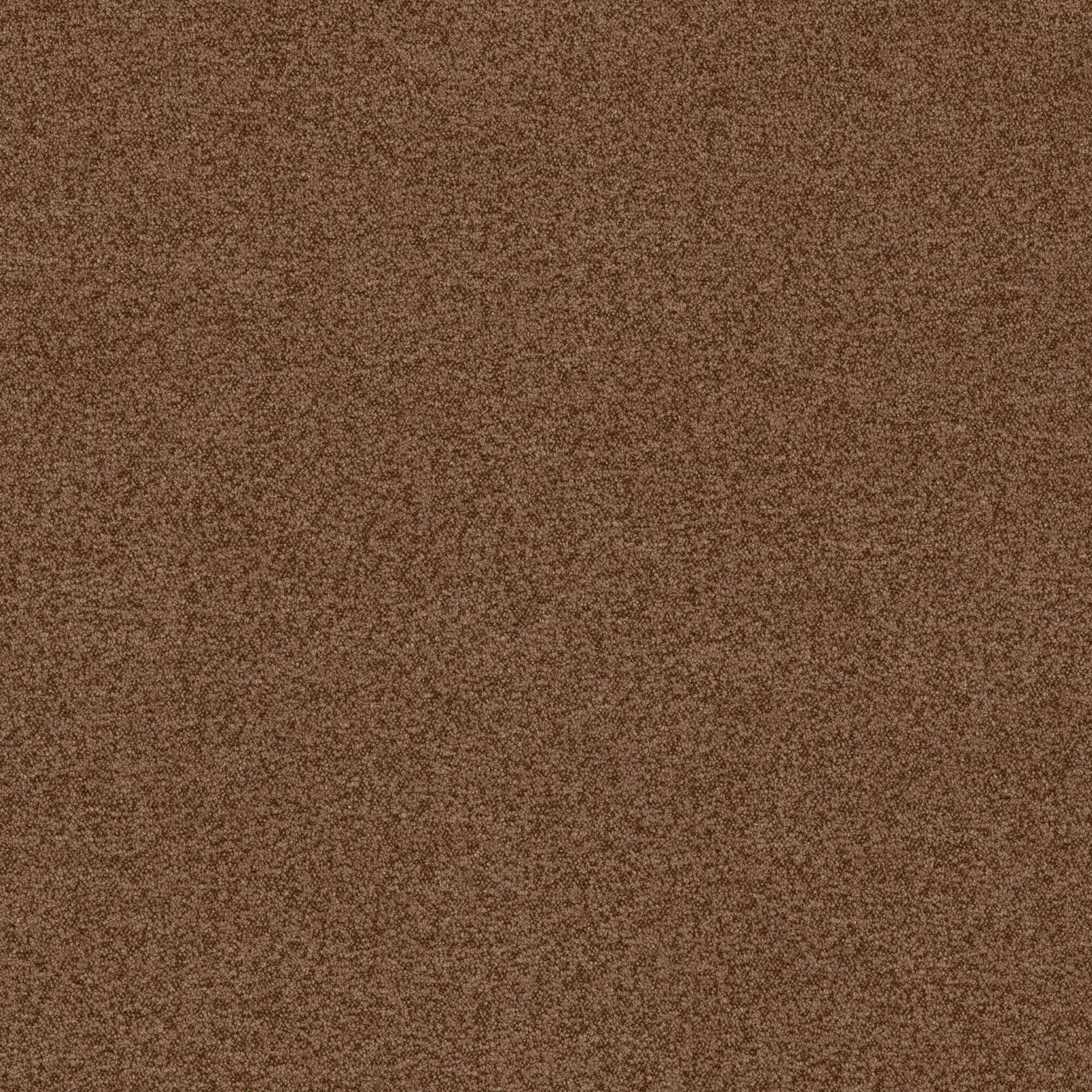 Close-up of warm nutmeg-brown bouclé with dense, peppered nubby texture