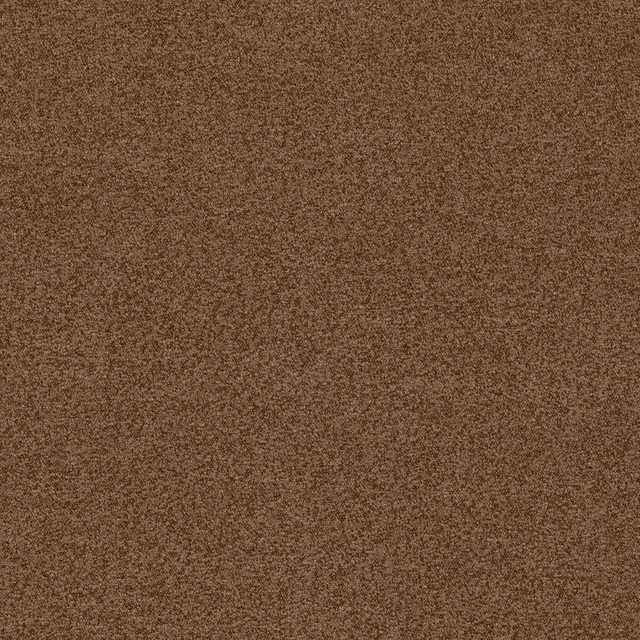 Close-up of warm nutmeg-brown bouclé with dense, peppered nubby texture