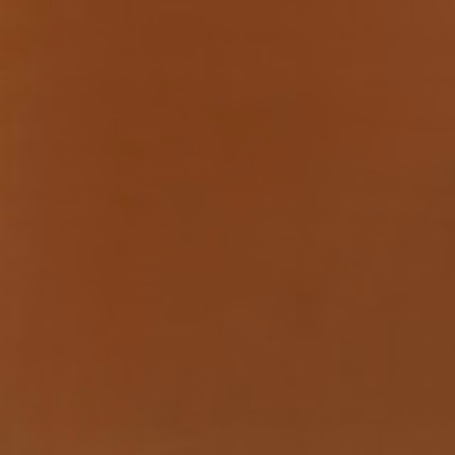 Warm chestnut brown velvet showing a smooth, subtly light-catching plain pile