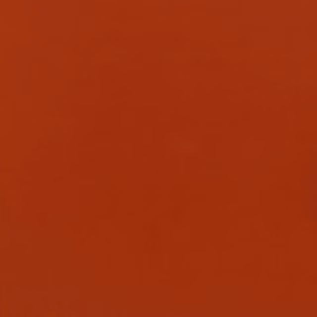 Plain deep coral-red velvet with a subtly shaded plush nap