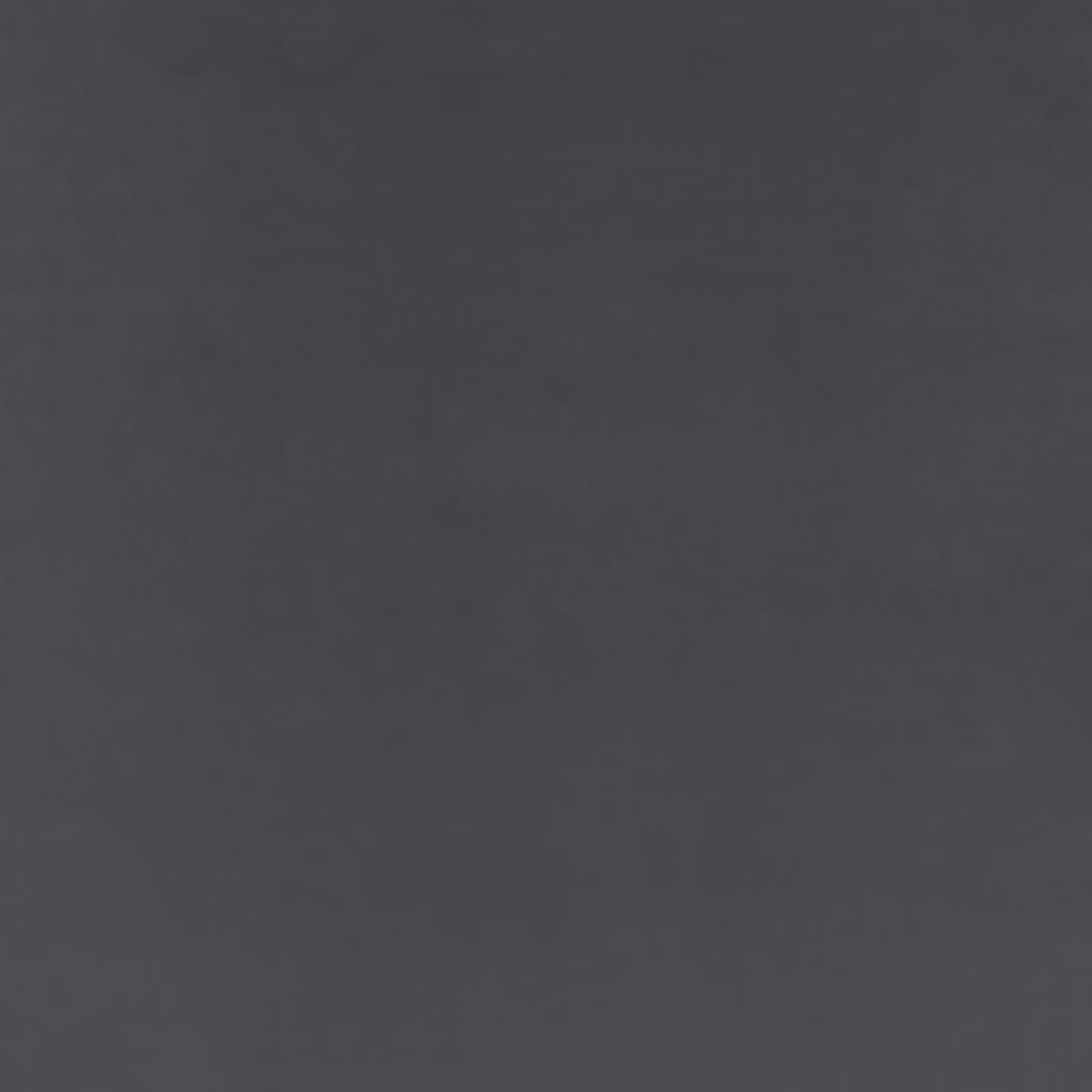 Deep graphite velvet with a smooth, subtly directional nap and even surface