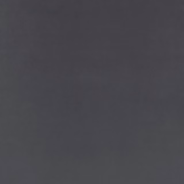 Deep graphite velvet with a smooth, subtly directional nap and even surface