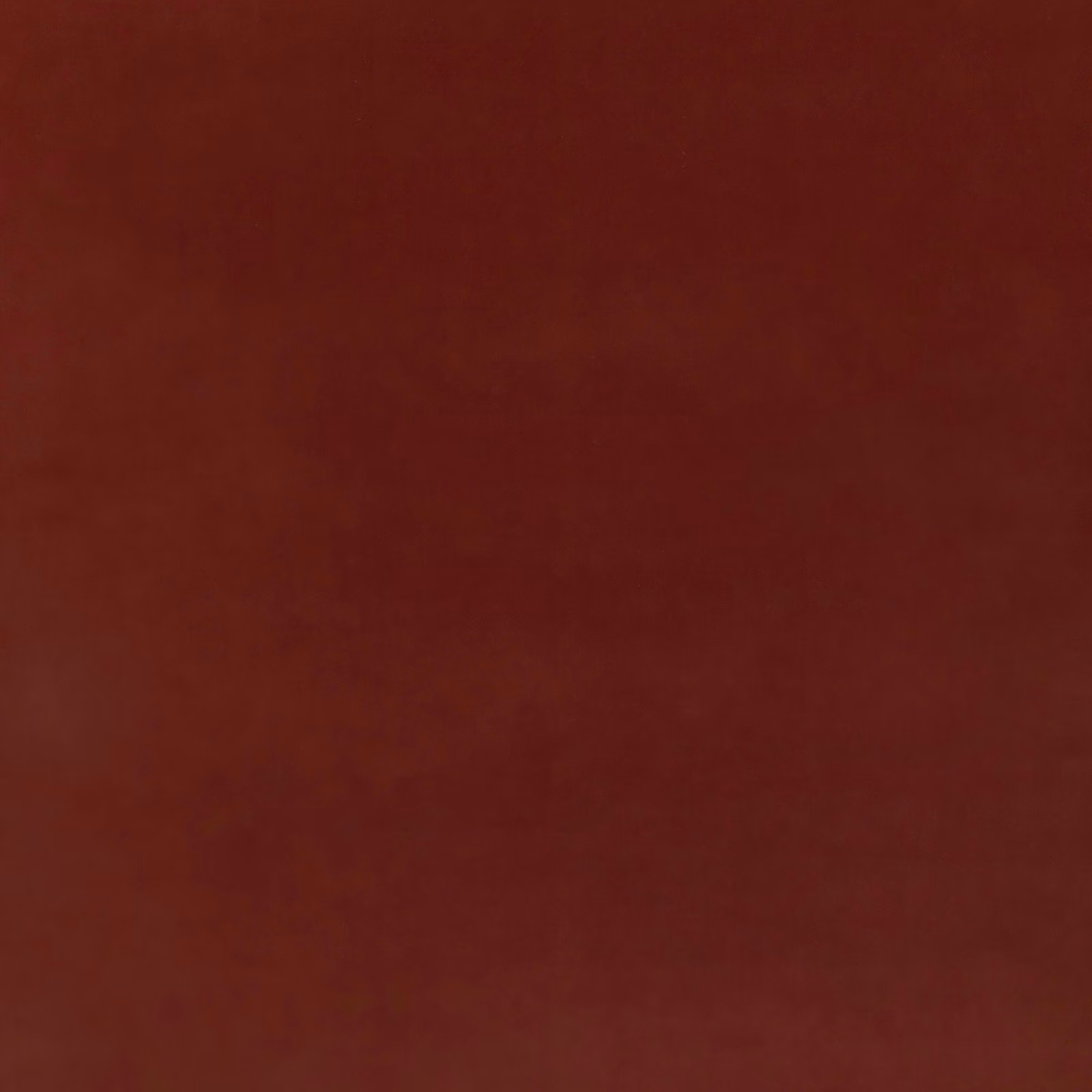 Deep mulberry velvet with subtle nap shading and a plain, plush surface
