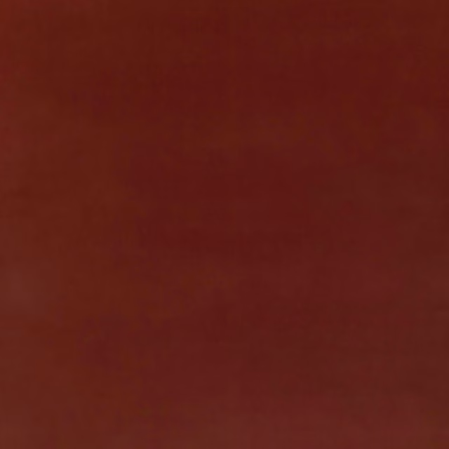 Deep mulberry velvet with subtle nap shading and a plain, plush surface