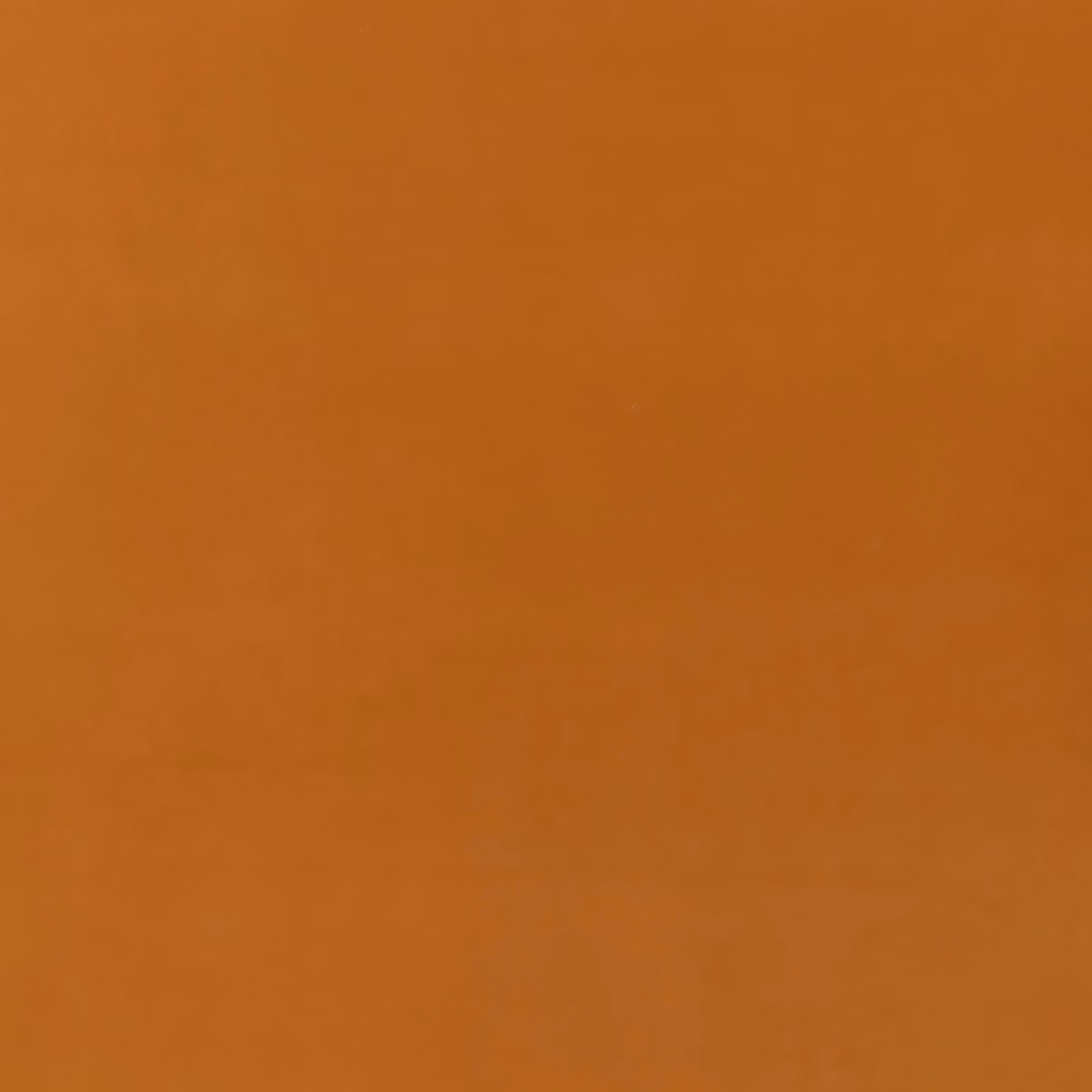Warm camel-tan velvet with subtle nap shading across a plain surface