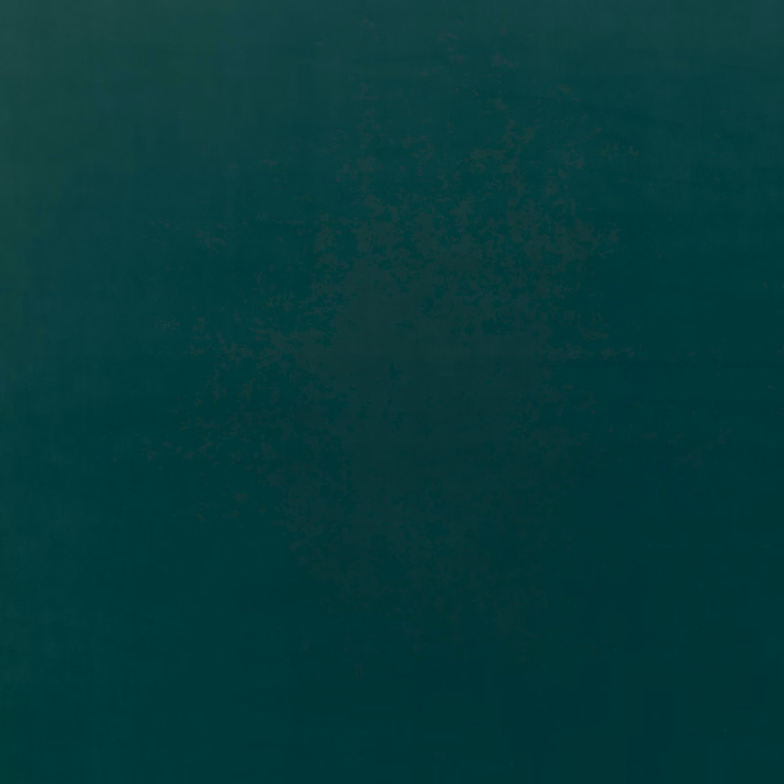 Deep teal velvet swatch showing a plush nap with subtle tonal light variation