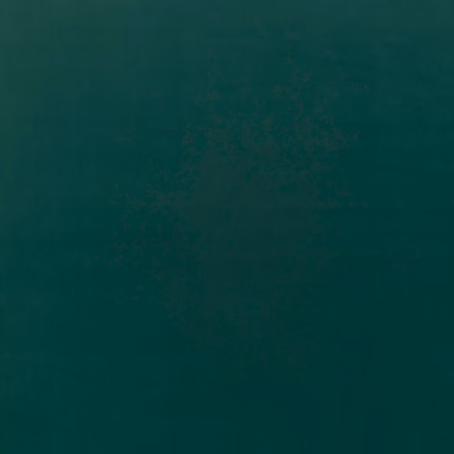 Deep teal velvet swatch showing a plush nap with subtle tonal light variation