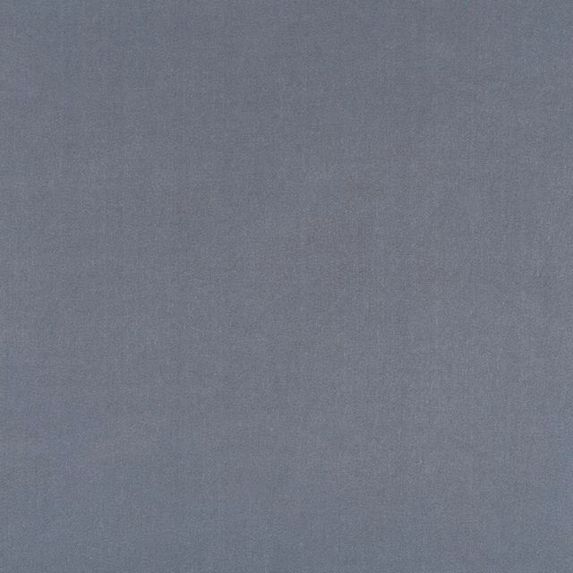 Cool denim-blue linen with a softly mottled, finely woven surface