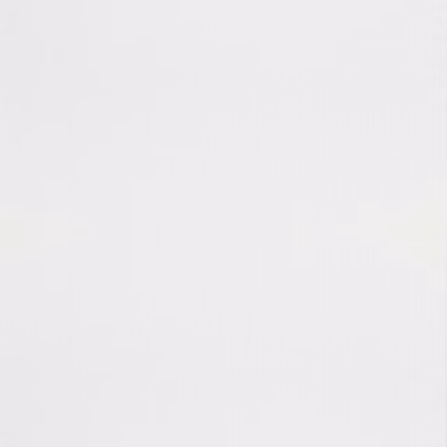 Warm ivory plain linen with faint vertical weave variation across the swatch