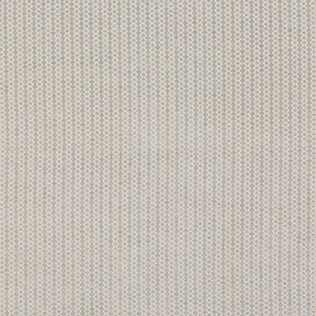 Close view of soft blue-grey woven fabric with tiny pale diamond motifs