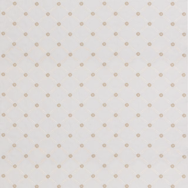 Ivory lattice fabric with tiny taupe rosettes arranged across the woven ground