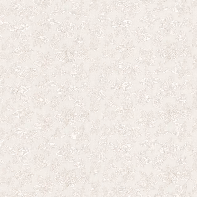 Ivory fabric with delicate pale grey leafy outlines and softly textured ground