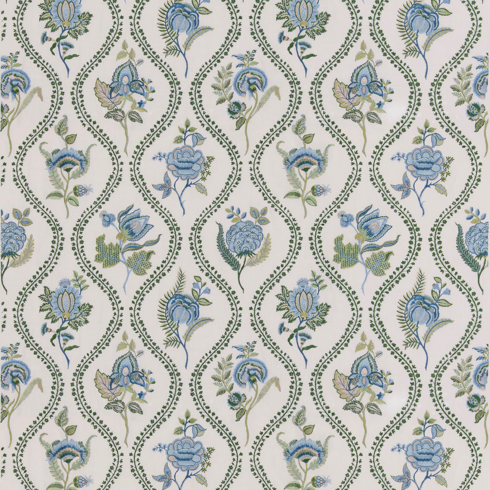 Cream floral fabric with blue blooms and emerald scrolling paisley trails