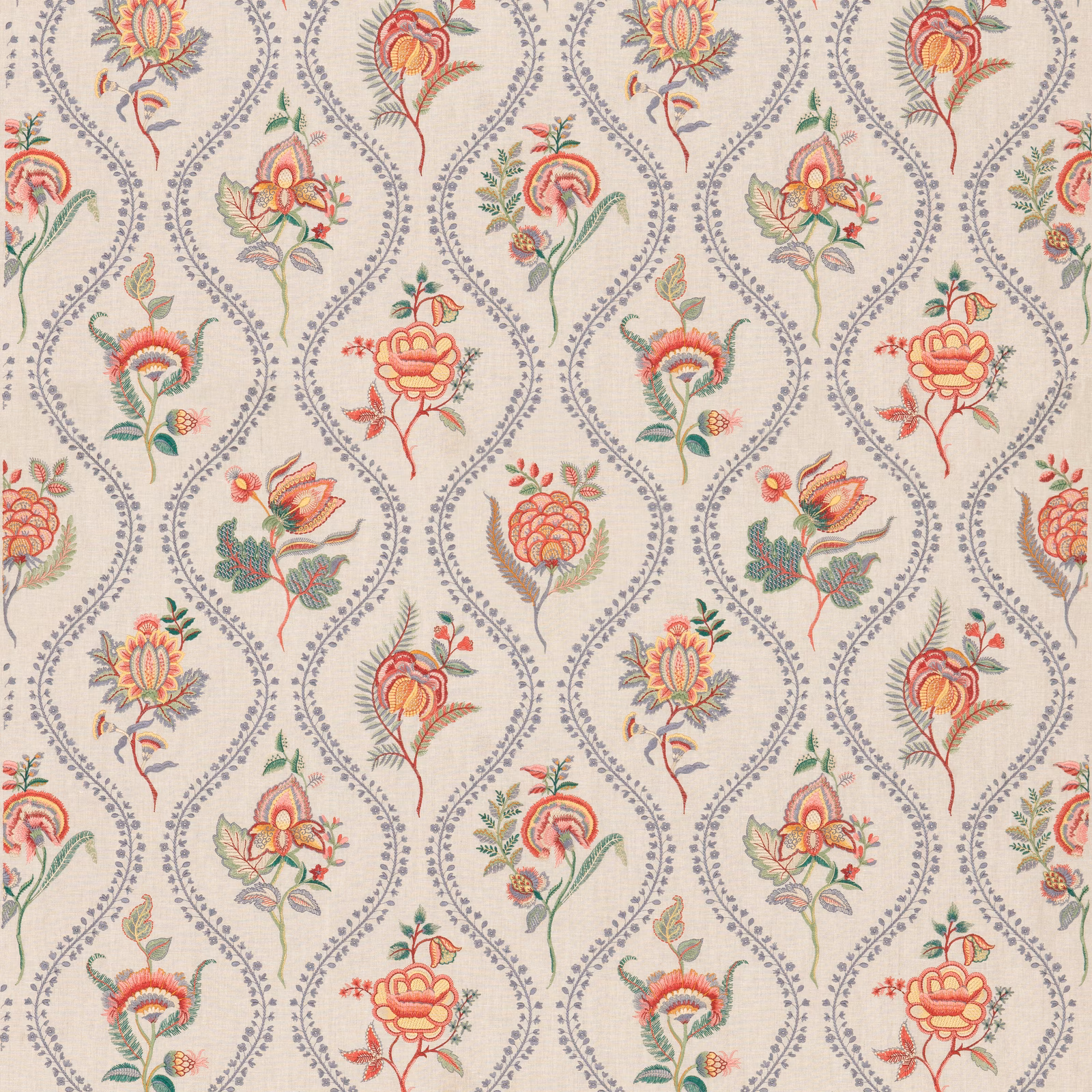 Cream embroidered fabric with blue scrolling trails and coral-red floral blooms
