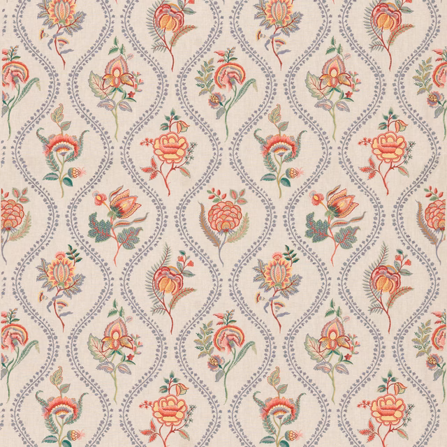 Cream embroidered fabric with blue scrolling trails and coral-red floral blooms