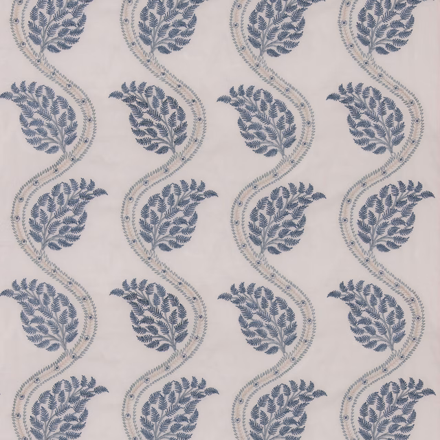 Dusty blue leafy paisley sprays repeat across a pale blush ground