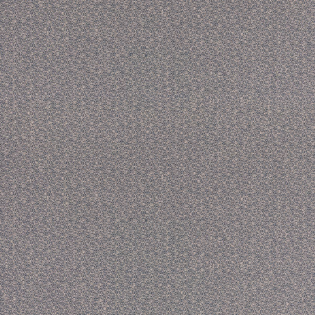 Close-up of muted indigo and grey micro-textured woven fabric surface