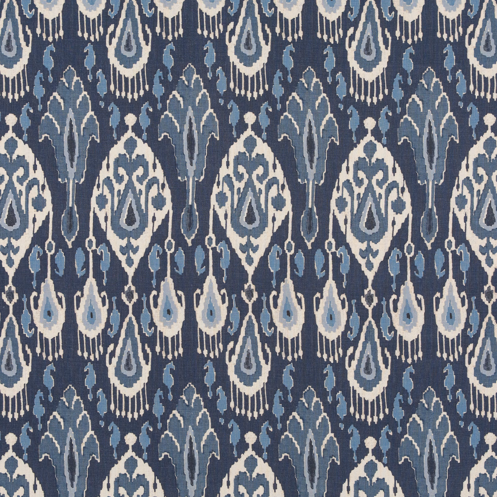 Cool indigo linen with pale ikat teardrops and blue-grey vertical motifs