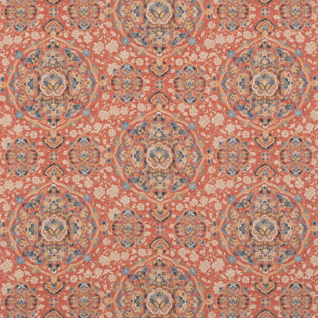 Coral-red woven fabric with blue and gold floral medallions and ivory sprigs